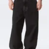 Astro Mid Rise Baggy Faux Leather Pocket Jeans – Black Rinse – Schwarz