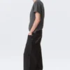 Astro Mid Rise Baggy Faux Leather Pocket Jeans – Black Rinse – Schwarz