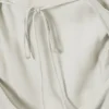 Asymmetrisches, ärmelloses Midi-Kleid mit Wasserfallausschnitt – Light Mole Asymmetrisches, ärmelloses Midi-Kleid mit Wasserfallausschnitt – Light Mole