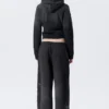 Baggy-Jogginghose mit mittlerer Leibhöhe und Nieten – Schwarz mit Print Baggy-Jogginghose mit mittlerer Leibhöhe und Nieten – Schwarz mit Print