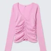 Belle B Strickjacke mit gerafftem V-Ausschnitt – Rosa Belle B Strickjacke mit gerafftem V-Ausschnitt – Rosa