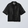 Boxy Mesh-Shirt mit kurzen Shorts – Schwarz Boxy Mesh-Shirt mit kurzen Shorts – Schwarz