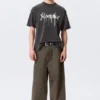 Boxy T-Shirt mit Print – Schwarz – Heartbeat
