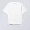 Boxy T-Shirt mit Print – Weiß – Grünes Symbol Boxy T-Shirt mit Print – Weiß – Grünes Symbol