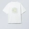Boxy T-Shirt mit Print – Weiß – Grünes Symbol Boxy T-Shirt mit Print – Weiß – Grünes Symbol