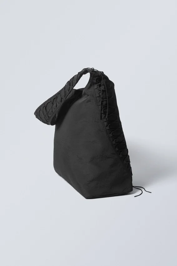 Dawa Schultertasche mit Kordelzug – Schwarz Dawa Schultertasche mit Kordelzug – Schwarz