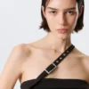 Faustina C Ein-Schulter-Top mit Schnallenverschluss – Schwarz Faustina C Ein-Schulter-Top mit Schnallenverschluss – Schwarz