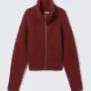 Gerippte Strickjacke mit Reißverschluss – Dunkelrot meliert Gerippte Strickjacke mit Reißverschluss – Dunkelrot meliert