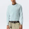 Geschrumpfter Strickpullover aus Baumwolle – gewaschen, hellblau Geschrumpfter Strickpullover aus Baumwolle – gewaschen, hellblau