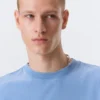 Geschrumpftes Baumwoll-T-Shirt mit kurzen Ärmeln – Blau Geschrumpftes Baumwoll-T-Shirt mit kurzen Ärmeln – Blau