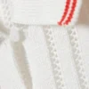 Gestricktes kurzärmeliges Baumwoll-Polohemd – Weiß – Rote Streifen Gestricktes kurzärmeliges Baumwoll-Polohemd – Weiß – Rote Streifen
