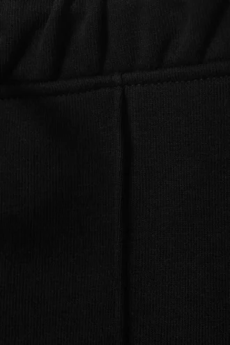 Jogginghose mit mittlerer Leibhöhe, Biesen und ausgestelltem Bein – Schwarz Jogginghose mit mittlerer Leibhöhe, Biesen und ausgestelltem Bein – Schwarz