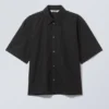 Kastenförmiges Baumwollhemd mit kurzen Shorts – Schwarz Kastenförmiges Baumwollhemd mit kurzen Shorts – Schwarz