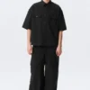Kastenförmiges Baumwollhemd mit kurzen Shorts – Schwarz Kastenförmiges Baumwollhemd mit kurzen Shorts – Schwarz