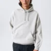Klassischer Kapuzenpullover – Grau meliert Klassischer Kapuzenpullover – Grau meliert