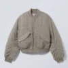 Kurze Bomberjacke mit Ösen – Dusty Mole Kurze Bomberjacke mit Ösen – Dusty Mole