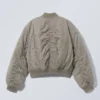 Kurze Bomberjacke mit Ösen – Dusty Mole Kurze Bomberjacke mit Ösen – Dusty Mole