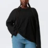 Langarm-Kastenförmiges Baumwoll-T-Shirt – Schwarz Langarm-Kastenförmiges Baumwoll-T-Shirt – Schwarz
