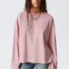 Langarmshirt aus Baumwolle – Korallen-/Fliederstreifen Langarmshirt aus Baumwolle – Korallen-/Fliederstreifen