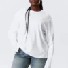 Langarmshirt aus Baumwolle – Weiß Langarmshirt aus Baumwolle – Weiß