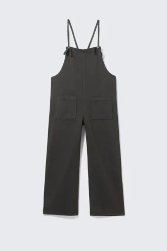 Latzhose aus Denim mit Bindebändern – Schwarz