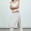 Locker sitzende Hose mit Nieten und mittlerer Leibhöhe – Off-White Locker sitzende Hose mit Nieten und mittlerer Leibhöhe – Off-White
