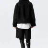 Locker sitzende Wolljacke mit Raglanärmeln – Schwarz Locker sitzende Wolljacke mit Raglanärmeln – Schwarz