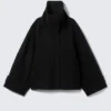 Locker sitzende Wolljacke mit Raglanärmeln – Schwarz Locker sitzende Wolljacke mit Raglanärmeln – Schwarz