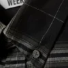 Locker sitzendes Flanellhemd mit Knopfleiste – schwarz kariert Locker sitzendes Flanellhemd mit Knopfleiste – schwarz kariert