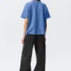 Locker sitzendes, kastenförmiges Baumwoll-T-Shirt – gewaschenes Blau Locker sitzendes, kastenförmiges Baumwoll-T-Shirt – gewaschenes Blau