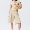 Lockere Dreiviertel-Anzugshorts mit niedriger Leibhöhe – Hellbeige Lockere Dreiviertel-Anzugshorts mit niedriger Leibhöhe – Hellbeige