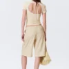 Lockere Dreiviertel-Anzugshorts mit niedriger Leibhöhe – Hellbeige Lockere Dreiviertel-Anzugshorts mit niedriger Leibhöhe – Hellbeige