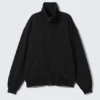 Lockere Strickjacke mit Trichterkragen und Reißverschluss – Schwarz