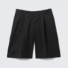 Lockere, tief sitzende Dreiviertel-Anzugshorts – Schwarz Lockere, tief sitzende Dreiviertel-Anzugshorts – Schwarz