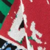 Lockerer, grafisch mit Print bedruckter Baumwoll-Pullover – mehrfarbiger Print Lockerer, grafisch mit Print bedruckter Baumwoll-Pullover – mehrfarbiger Print