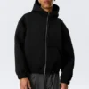 Lockerer Scuba-Kapuzenpullover mit hohem Kragen und Reißverschluss – Schwarz Lockerer Scuba-Kapuzenpullover mit hohem Kragen und Reißverschluss – Schwarz