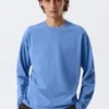 Lockeres, kastenförmiges Langarmshirt – Washed Blue Lockeres, kastenförmiges Langarmshirt – Washed Blue