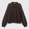 Lockeres Polo-Sweatshirt mit halbem Reißverschluss – Dunkelbraun