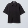 Lockeres, strukturiertes Kurzarm-Short – Schwarz Lockeres, strukturiertes Kurzarm-Short – Schwarz