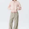 Lose Bootcut-Hose mit niedriger Leibhöhe – Light Mole Lose Bootcut-Hose mit niedriger Leibhöhe – Light Mole