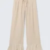 Lose Hose mit Volants und mittlerer Leibhöhe – Hellbeige Lose Hose mit Volants und mittlerer Leibhöhe – Hellbeige