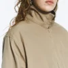 Lässige Baumwolljacke mit Trichterkragen – Beige Lässige Baumwolljacke mit Trichterkragen – Beige
