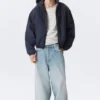 Lässige Bomberjacke mit Kapuze – gewaschenes Marineblau Lässige Bomberjacke mit Kapuze – gewaschenes Marineblau