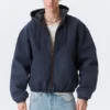 Lässige Bomberjacke mit Kapuze – gewaschenes Marineblau Lässige Bomberjacke mit Kapuze – gewaschenes Marineblau