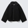 Mit Fell gefütterte Canvas-Jacke – Schwarz