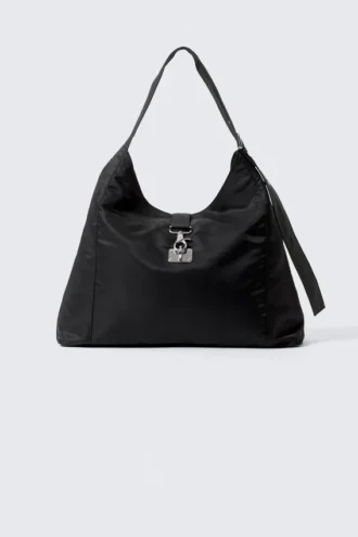 Mittlere, locker sitzende Schultertasche mit Verschluss – Schwarz