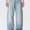 Nebula Unisex-Jeans mit mittlerer Leibhöhe und lockerem, tonnenförmigem Barrel – Kimberley Blue – Hellblau Nebula Unisex-Jeans mit mittlerer Leibhöhe und lockerem, tonnenförmigem Barrel – Kimberley Blue – Hellblau