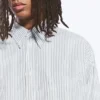 Oversize-Hemd mit Knöpfen und Streifen – Weiß – Blaue Streifen Oversize-Hemd mit Knöpfen und Streifen – Weiß – Blaue Streifen