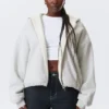 Oversized-Fleece-Kapuzenpullover mit Reißverschluss – Grau meliert Oversized-Fleece-Kapuzenpullover mit Reißverschluss – Grau meliert
