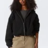 Oversized-Fleece-Kapuzenpullover mit Reißverschluss – Schwarz Oversized-Fleece-Kapuzenpullover mit Reißverschluss – Schwarz